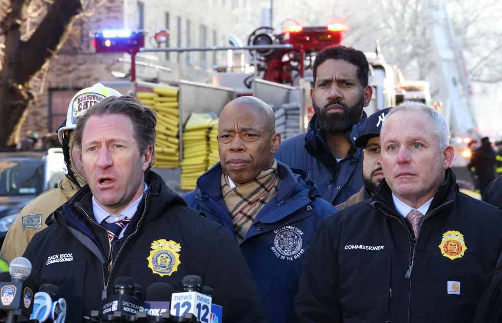 Press conference with EMT Commissioner Zach Iscol, NYC Mayor Eric Adams, and Fire Commissioner Robert Tucker at the site of a 5-alarm fire.