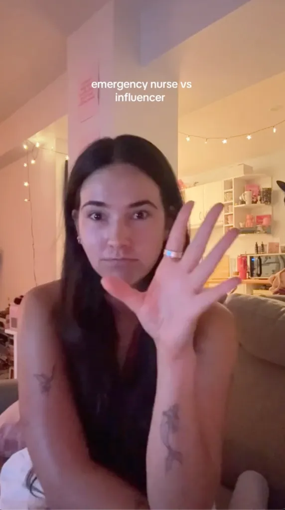 A woman holding her hand up with the text 