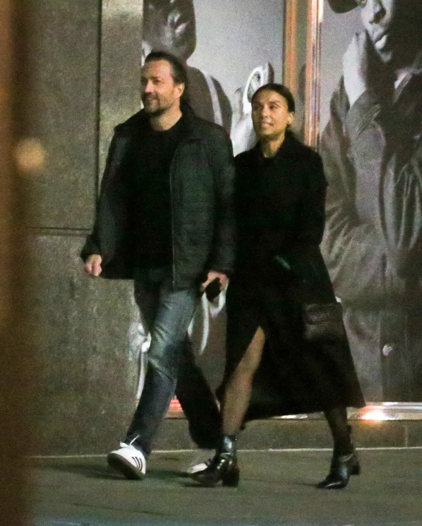 Andrew Shue and Marilee Fiebig walking together on a New York City street at night.