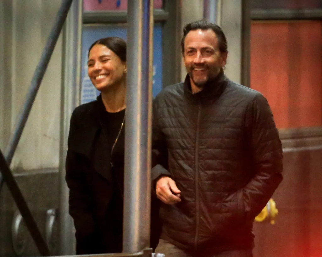 Andrew Shue and Marilee Fiebig smiling together on a date night in New York City.