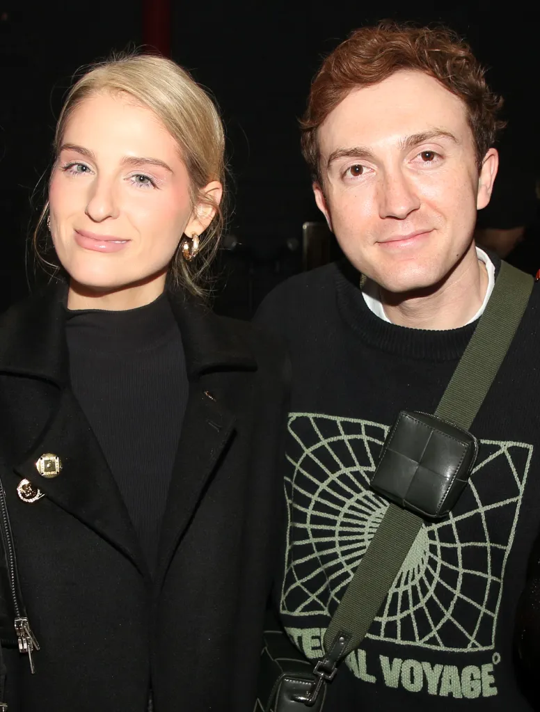 Meghan Trainor and Daryl Sabara posing backstage.