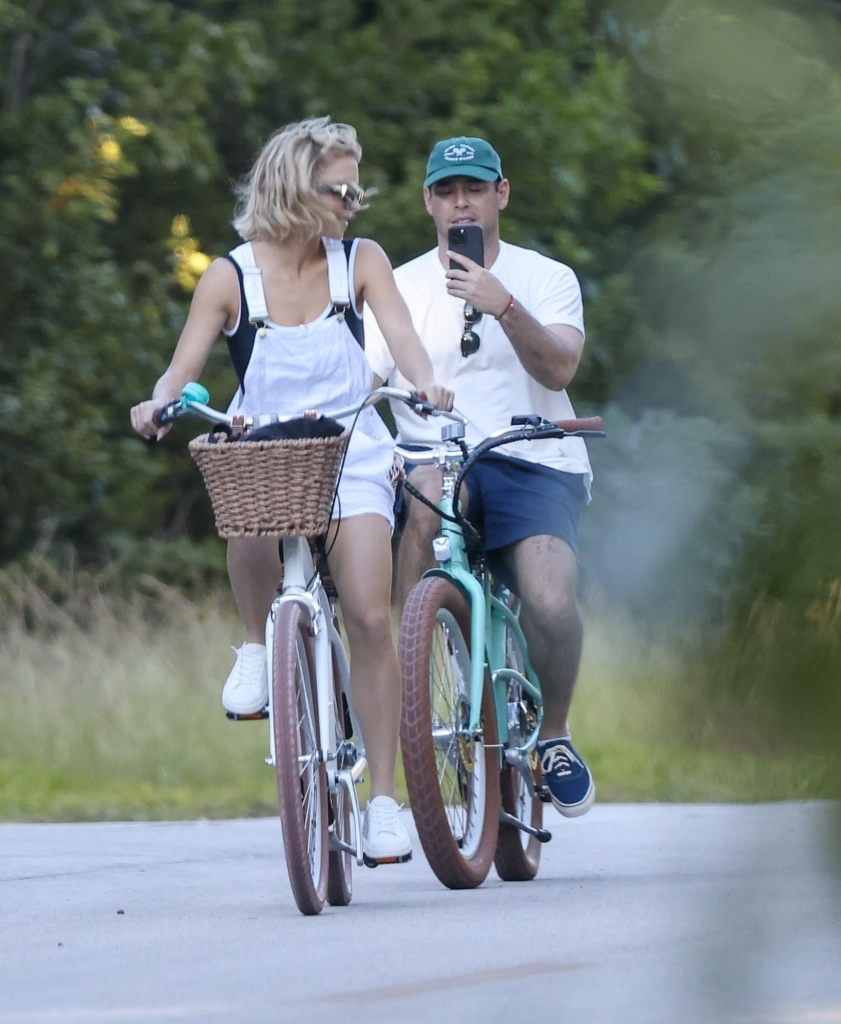 Sydney Sweeney and Scooter Braun bike together.