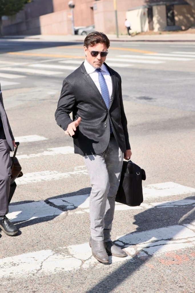 Aaron Phypers leaving the courthouse after a restraining order against him remained in place.