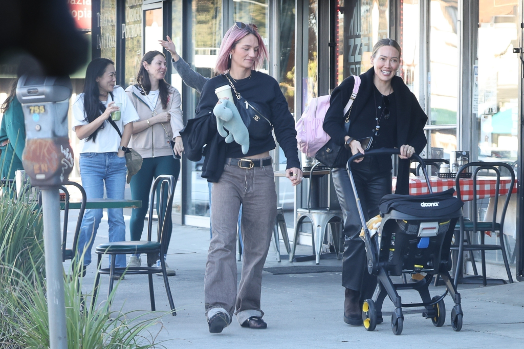 Hilary Duff pushes a baby stroller while out with friends.