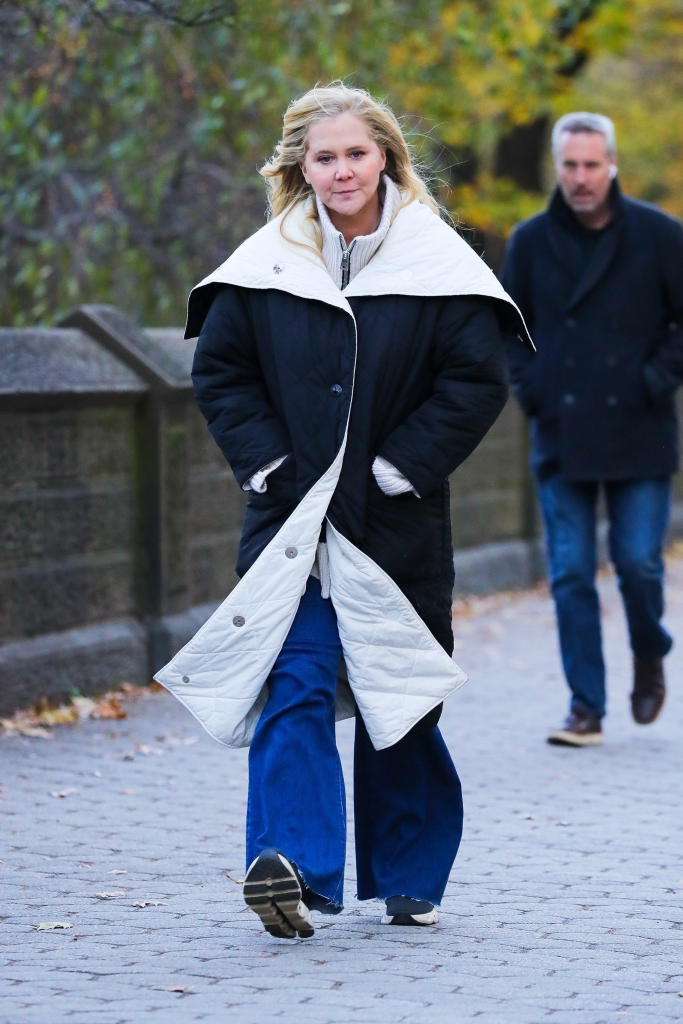 Amy Schumer strolling in New York in a fall outfit.