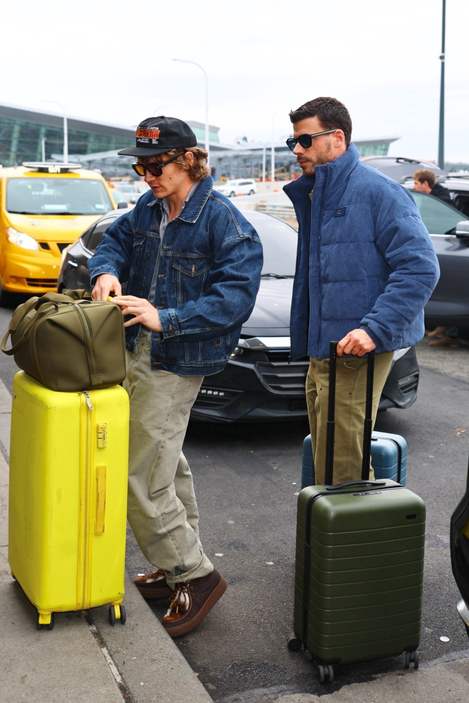 Connor Storrie and François Arnaud depart JFK Airport together.