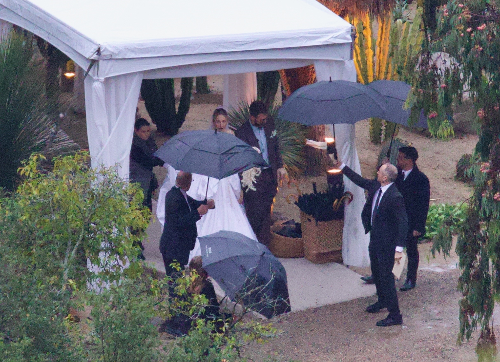 Este Haim, Taylor Swift, and Jonathan Levin at Este Haim's New Year's Eve wedding.