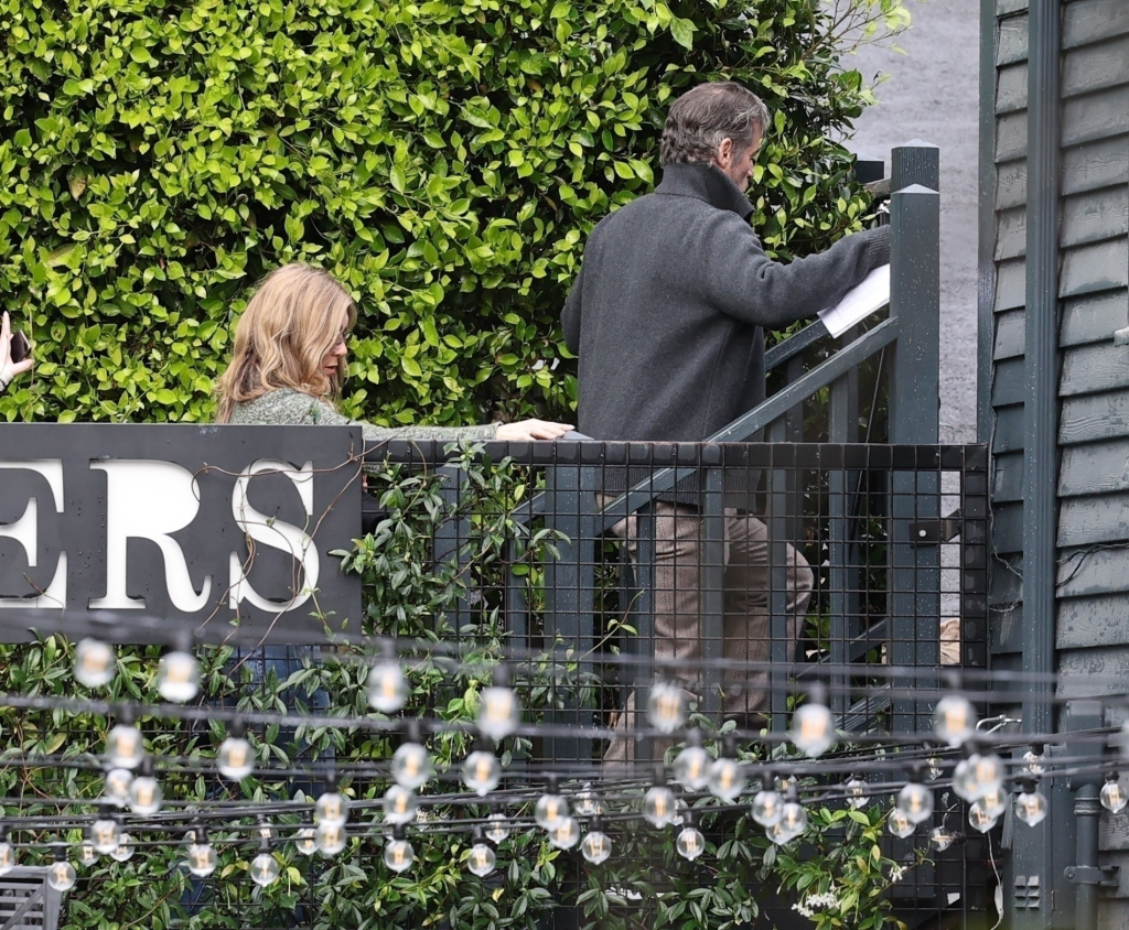 Jennifer Aniston and Jim Curtis attend his sold-out event at Godmothers Bookstore.