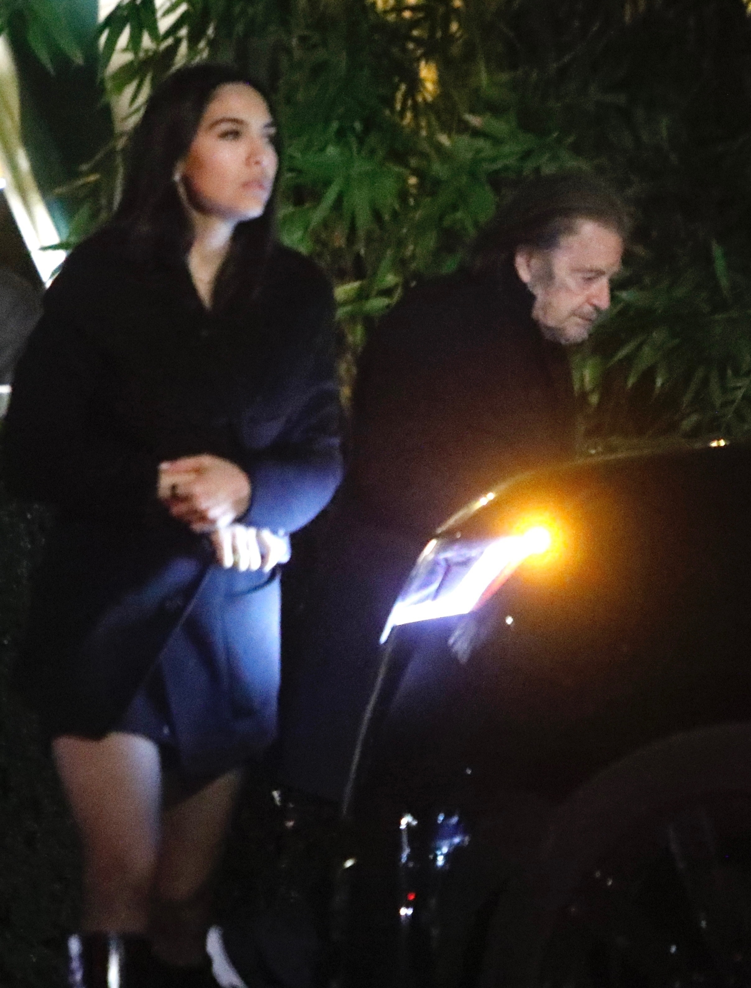 Al Pacino and Noor Alfallah dressed in black for a date night.
