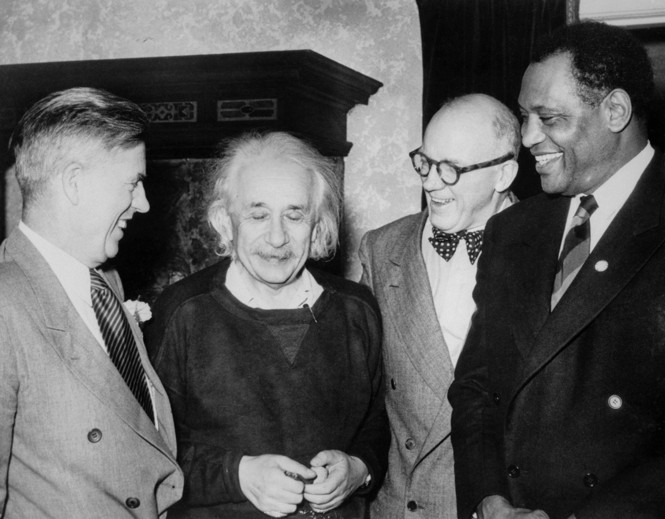 Former Vice President Henry Wallace, Physicist Albert Einstein, Lewis L. Wallace of Princeton University, and African American actor Paul Robeson meeting in Princeton, New Jersey.
