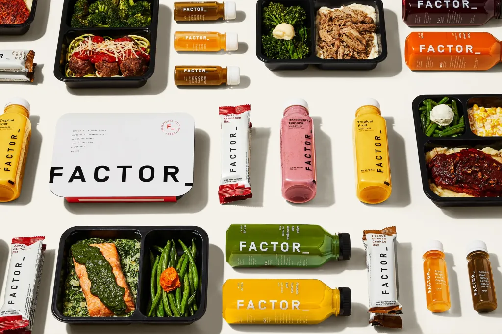 Factor meal kits and drinks on white table