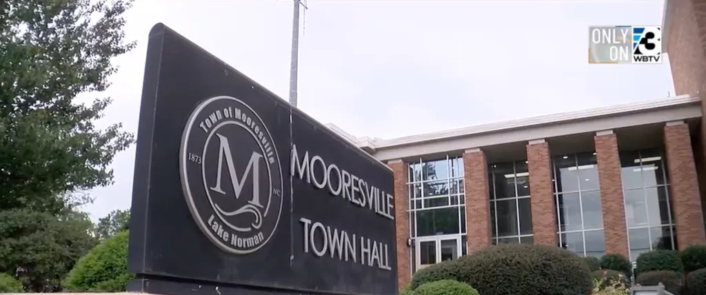 The Town of Mooresville sign in front of the town hall.