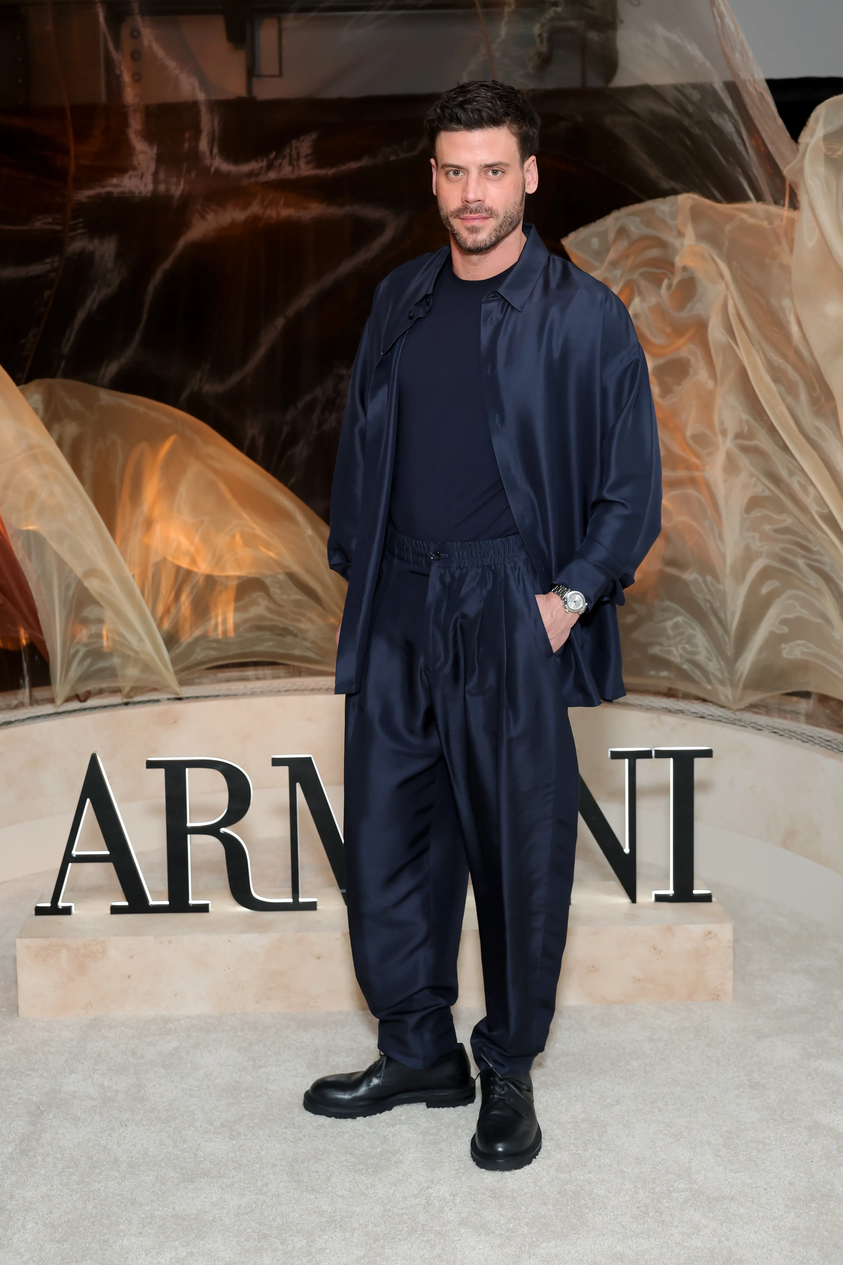 François Arnaud at the Armani beauty Luminous Silk event.