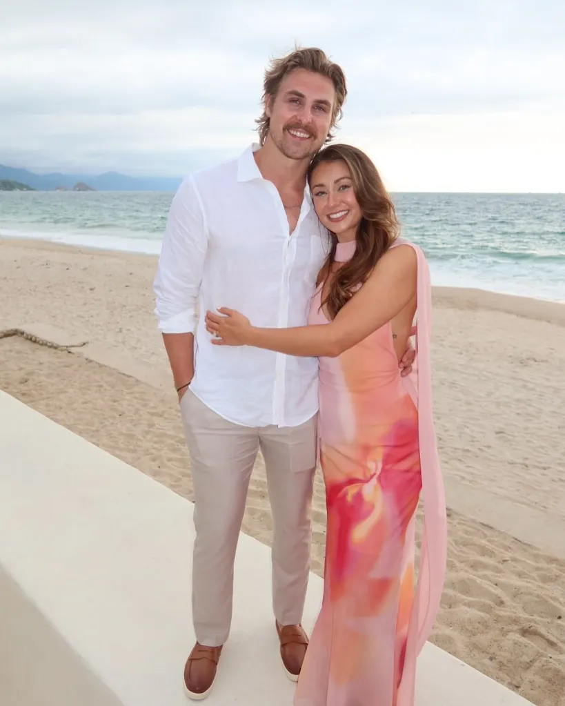 Kelcey Wetterberg and Nate Crnkovich standing together on a beach.