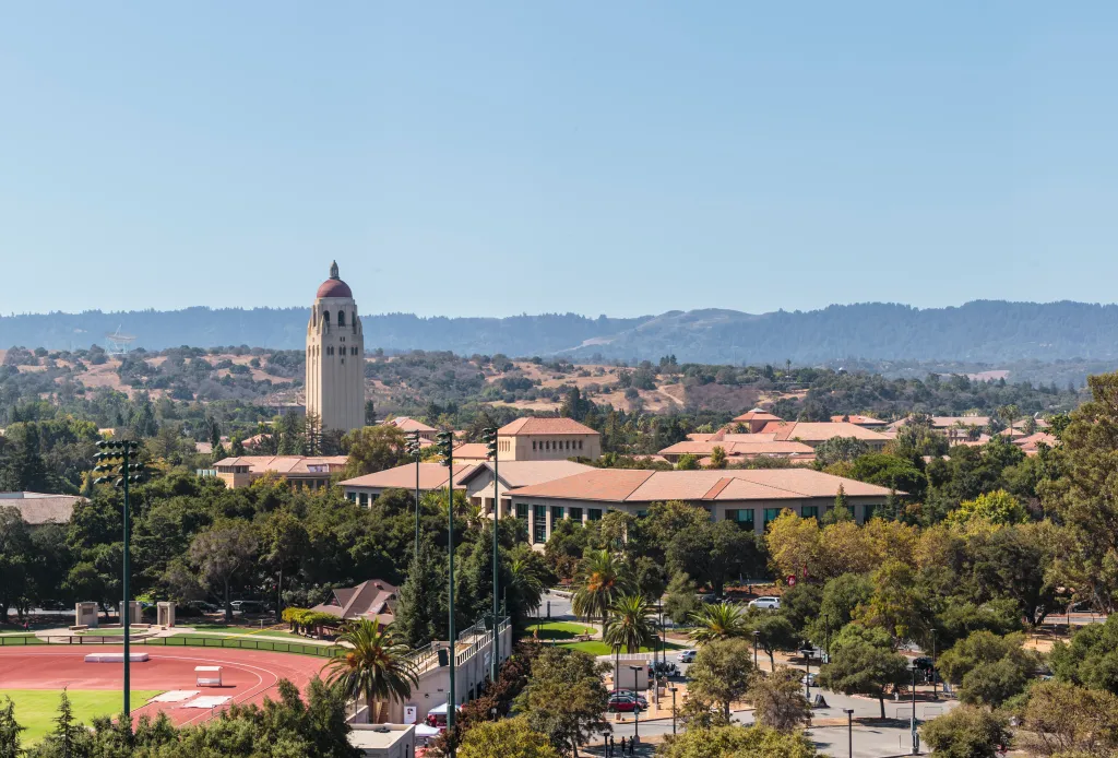 General view of Stanford University campus including Hoover Tower and track field.