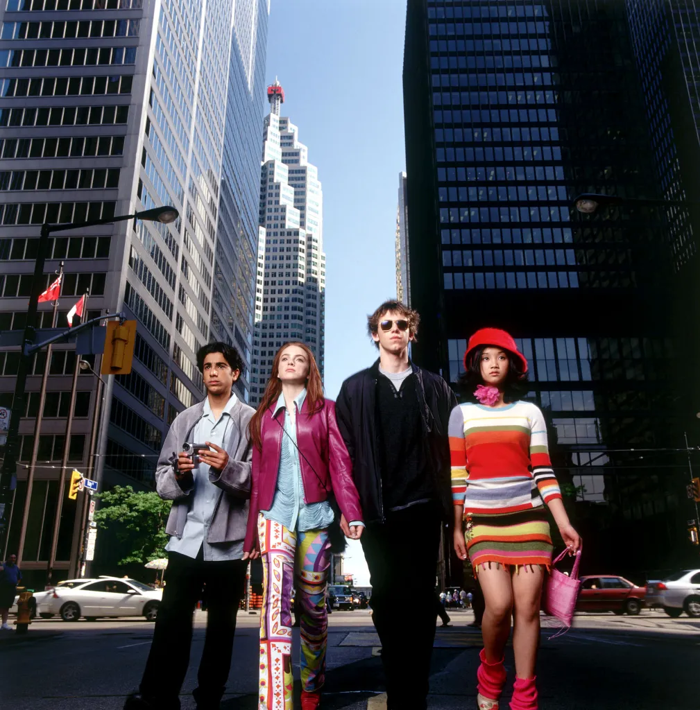 Lindsay Lohan, Ali Mukaddam, Bug Hall, and Brenda Song in 2000s fashion.