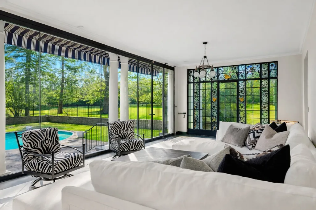 Plush seating looks out to the main pool.