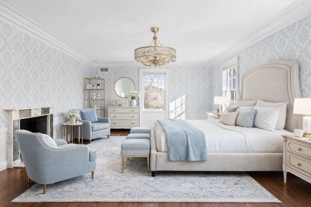 A fireplace also graces this bedroom.