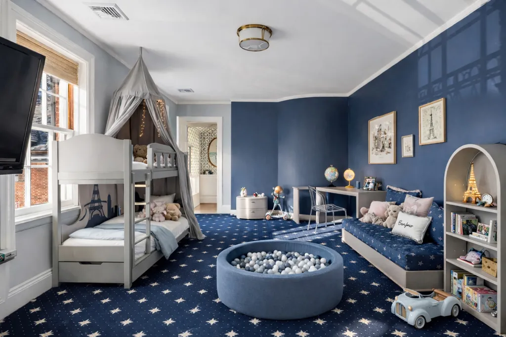 Meanwhile, a kids' bedroom comes with space to play.