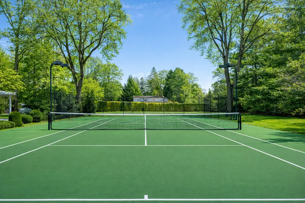 The tennis court.