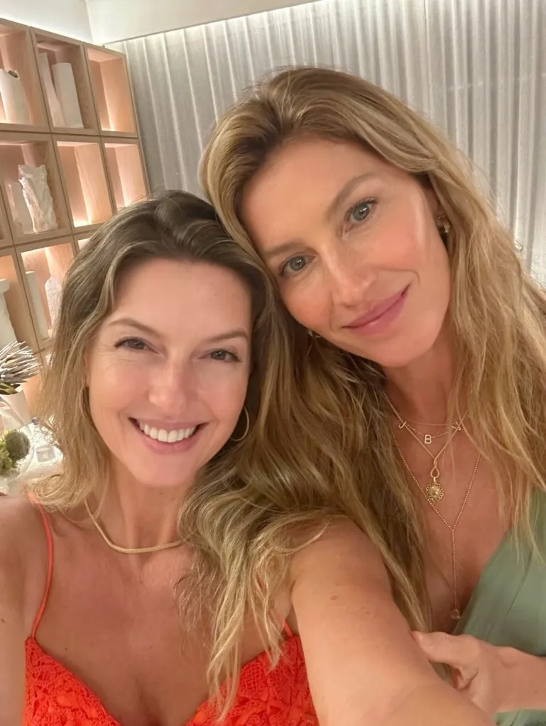 Gisele Bündchen smiles with a family member.