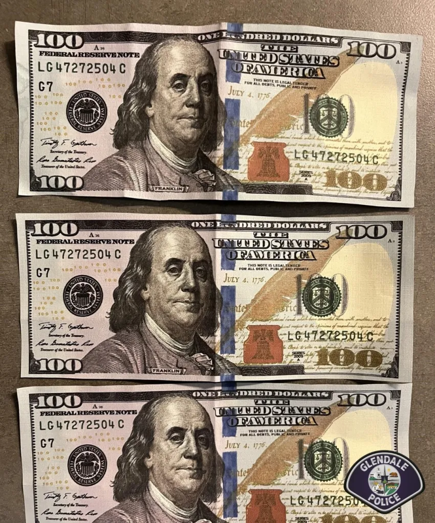 Three counterfeit $100 bills with the same serial number, with a Glendale Police badge in the bottom right corner.