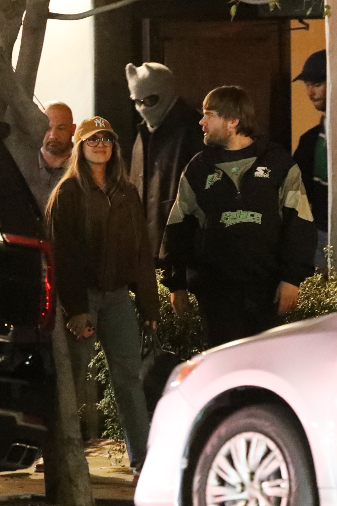 Bad Bunny in a horned beanie and dark shades with French Montana in Los Angeles.