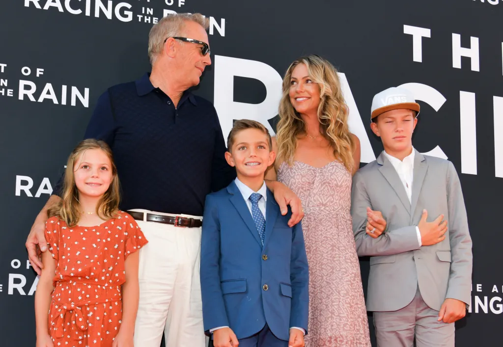 Kevin Costner, Christine Baumgartner, and their three children Grace, Hayes, and Cayden at the premiere of 
