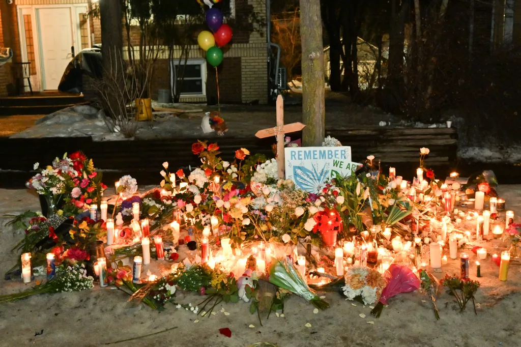 A growing memorial on the spot where Renee Nicole Good was killed in Minneapolis on Jan. 7, 2026.