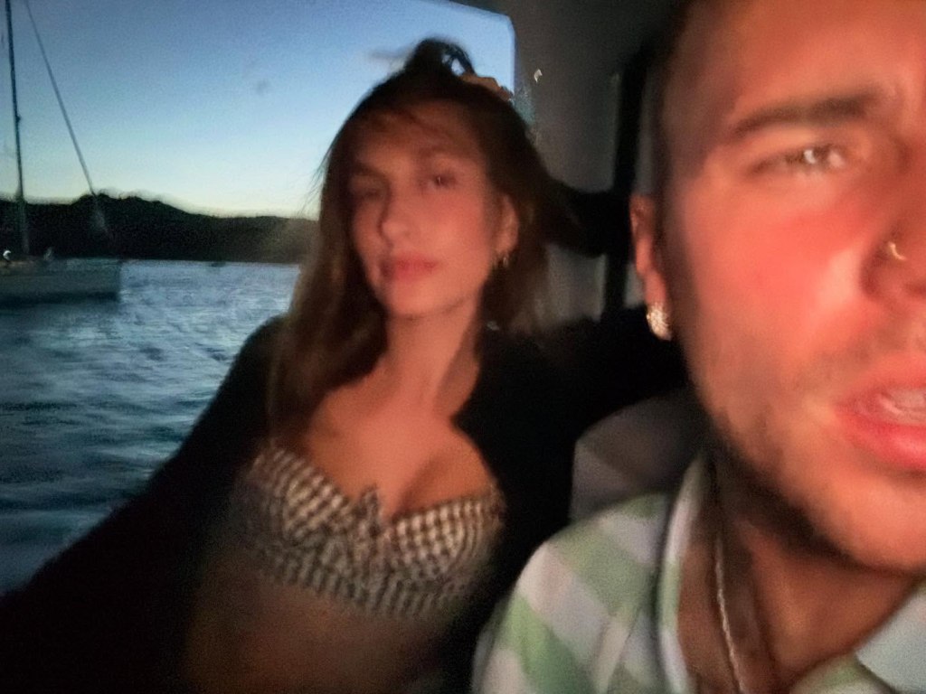 Hailey and Justin Bieber posing together.