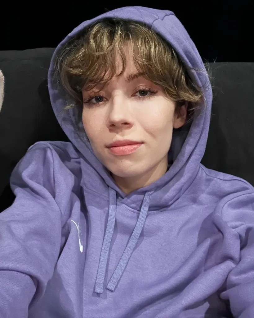 Jennette McCurdy wearing a purple hoodie.