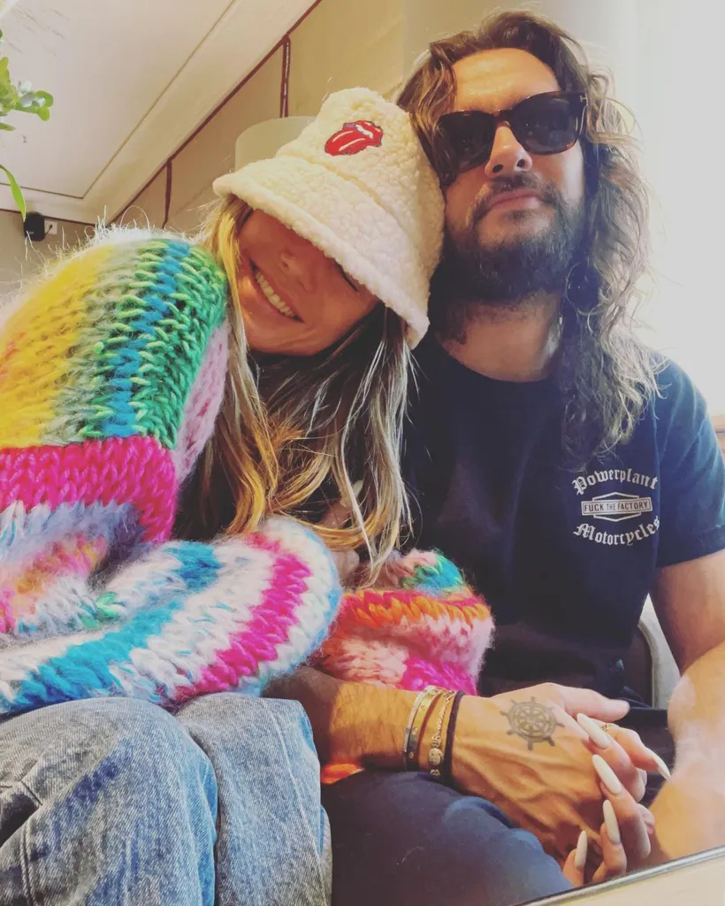Heidi Klum and Tom Kaulitz pose for a selfie.