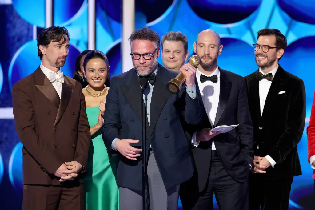 Seth Rogen, James Weaver, Chase Sui Wonders, Alex Gregory, Evan Goldberg, and Peter Huyck accepting the Golden Globe for Best TV Series – Musical or Comedy for “The Studio.”