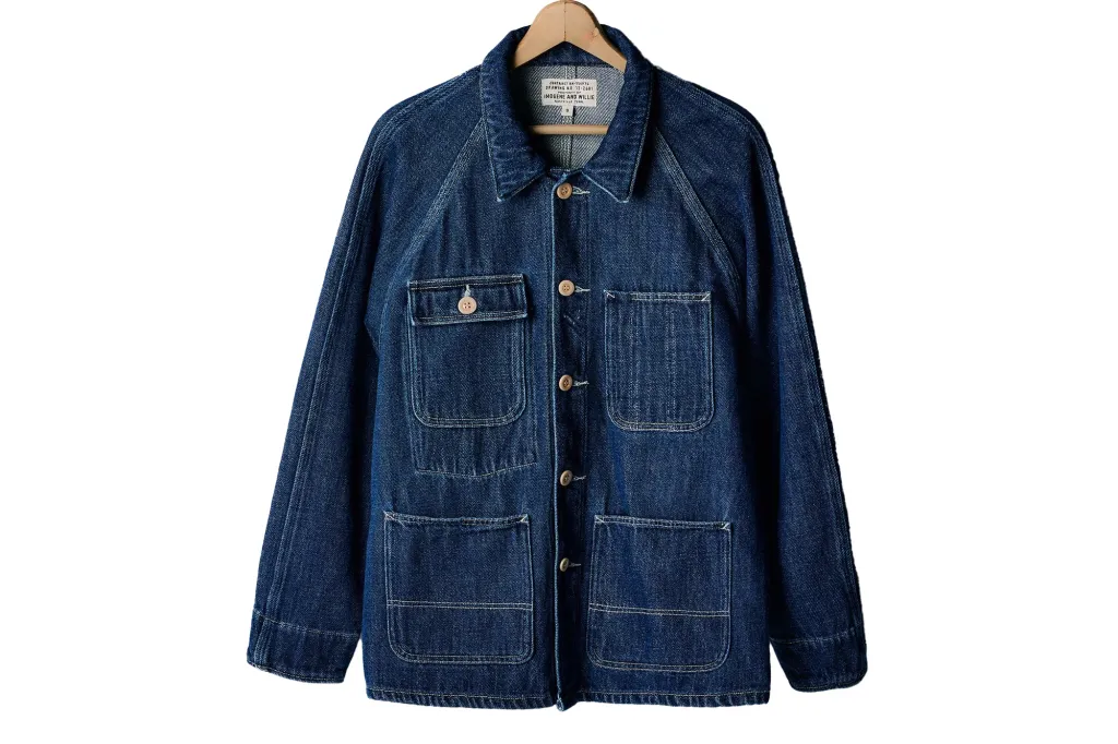 Dark wash denim jacket with a collar, four front pockets, and light-colored buttons.