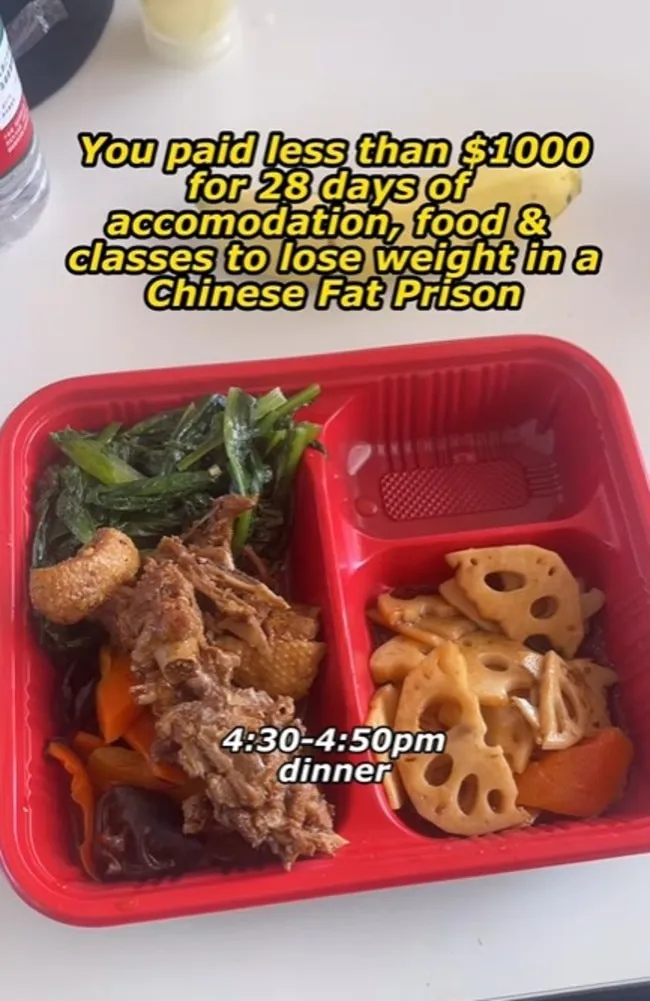 A red bento box containing dinner from a Chinese 