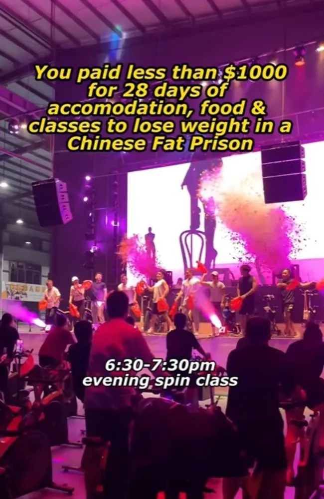 People participating in a spin class with instructors on a stage and text overlay about a 