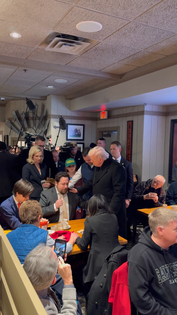 Trump paused during a restaurant stop in Iowa after a patron asked if he could pray for him ahead of the president’s remarks near Des Moines.
