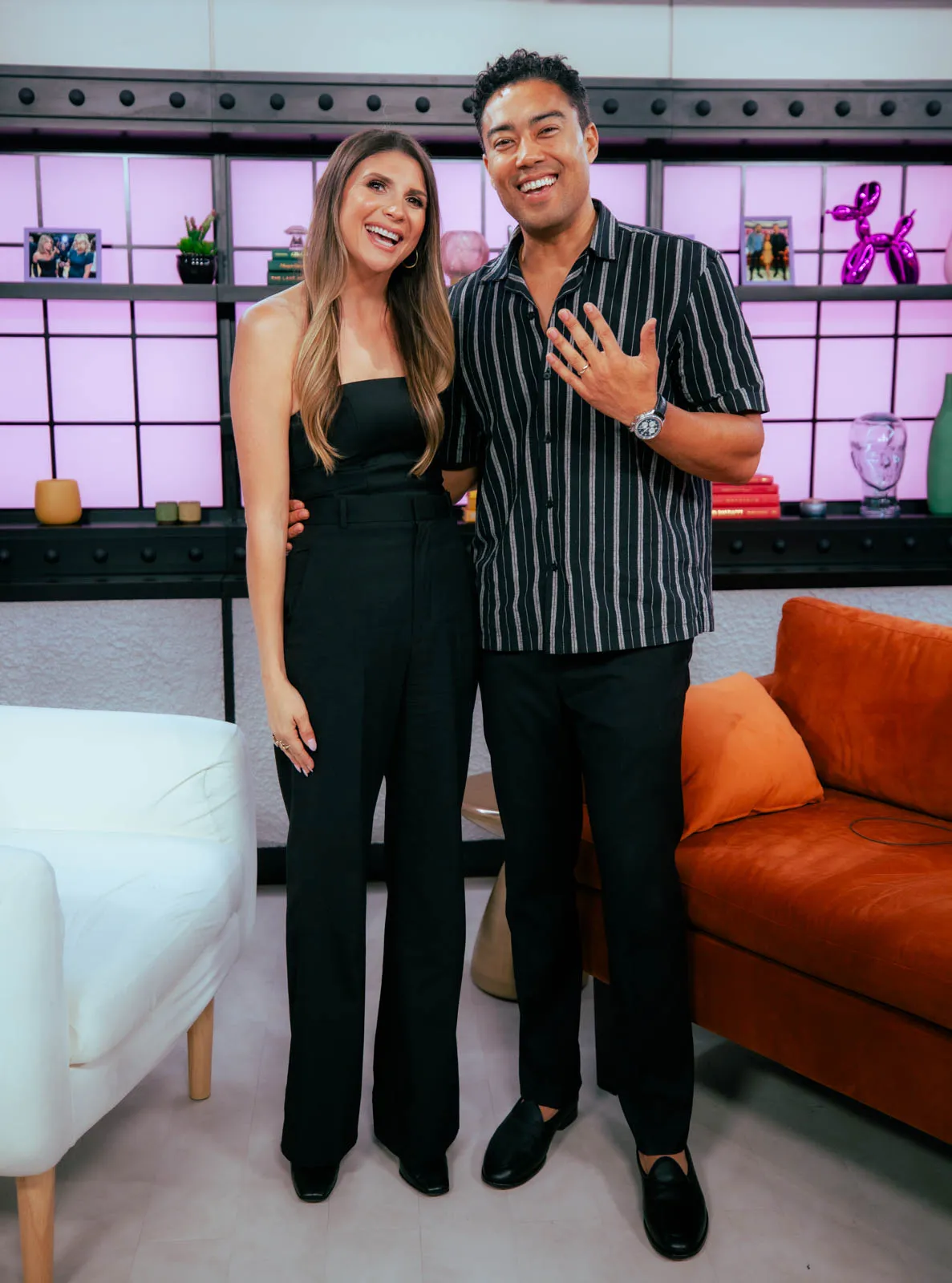 Jason and Janet Caperna of Bravo's The Valley standing together and smiling.