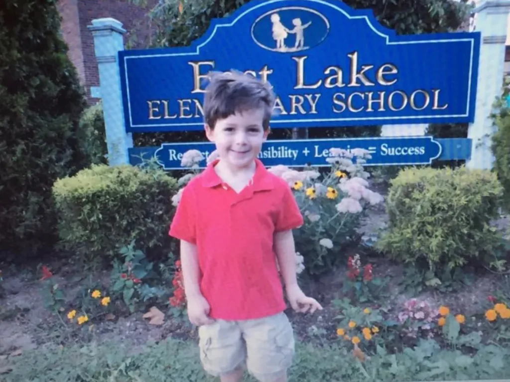 Jesse Findling, American Idol contestant, standing in front of East Lake Elementary School in Massapequa