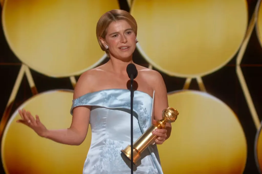 Jessie Buckley accepts an award at the 83rd Annual Golden Globe Awards.