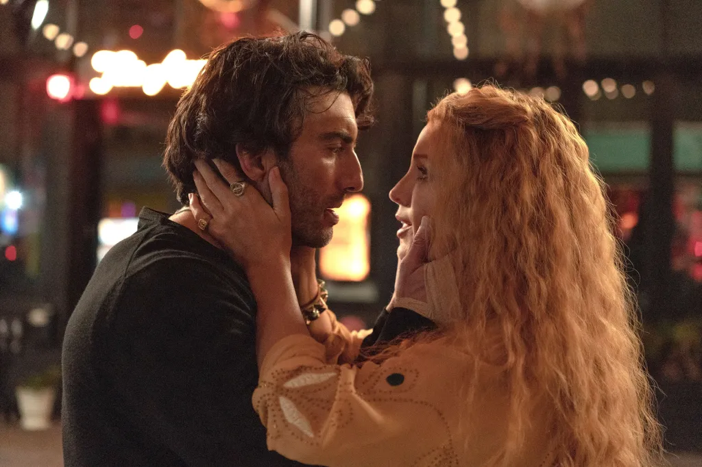 Justin Baldoni and Blake Lively look intently at each other in a scene from 