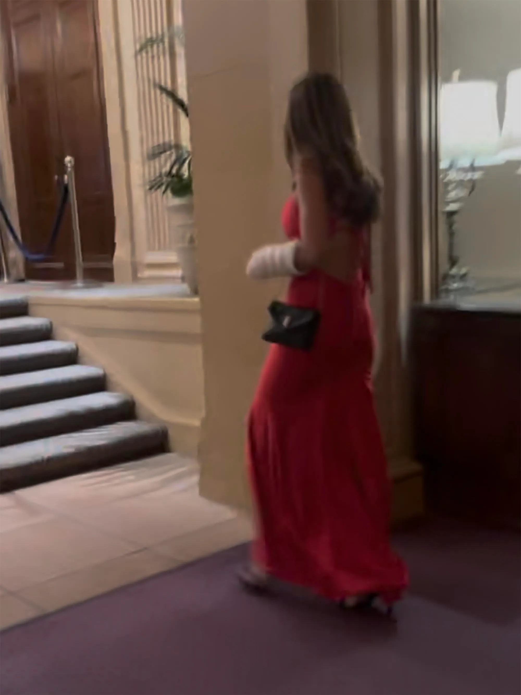 Kai Trump in a red dress.