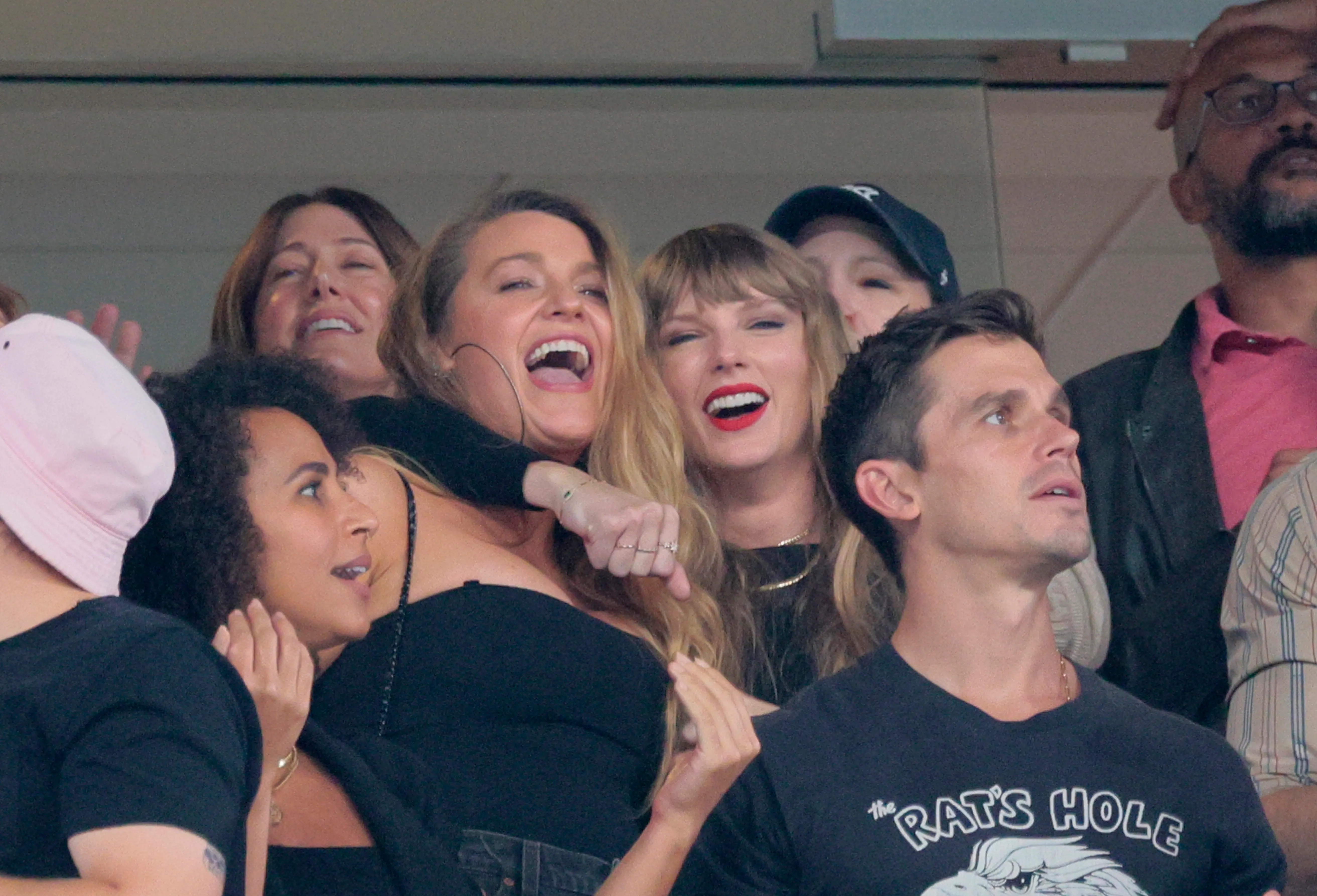 Taylor Swift and Blake Lively celebrating the Kansas City Chiefs' win against the New York Jets.