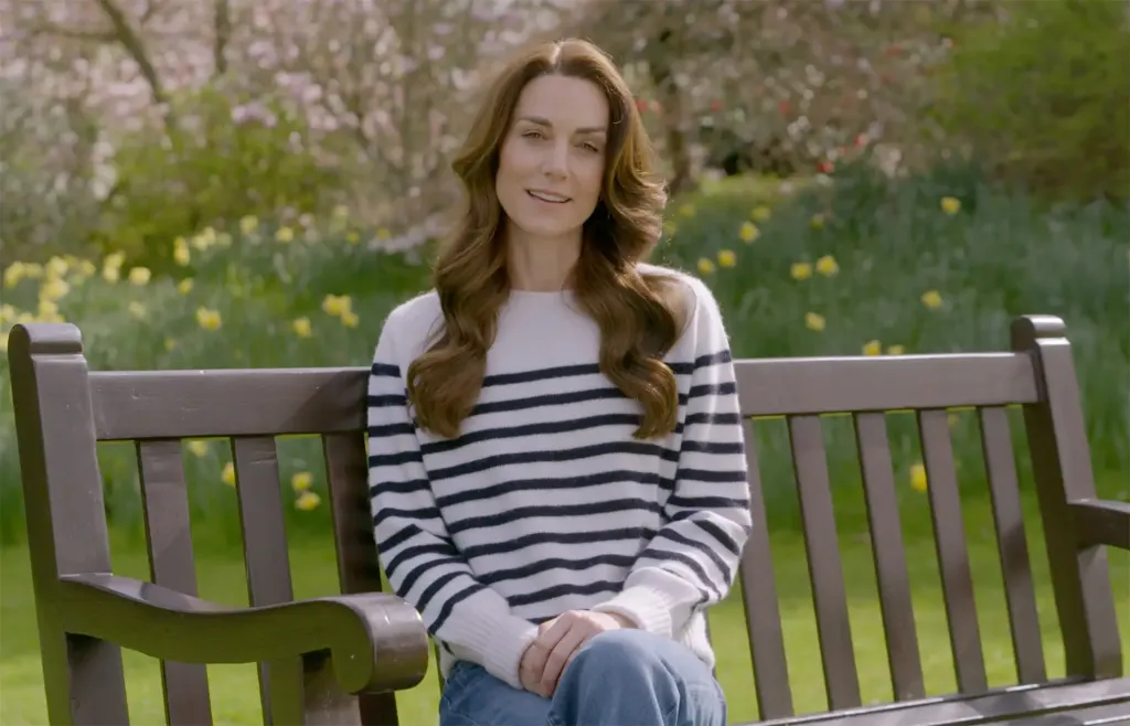 Kate Middleton, dressed in a striped sweater and jeans, sits on a park bench and reveals she has cancer.
