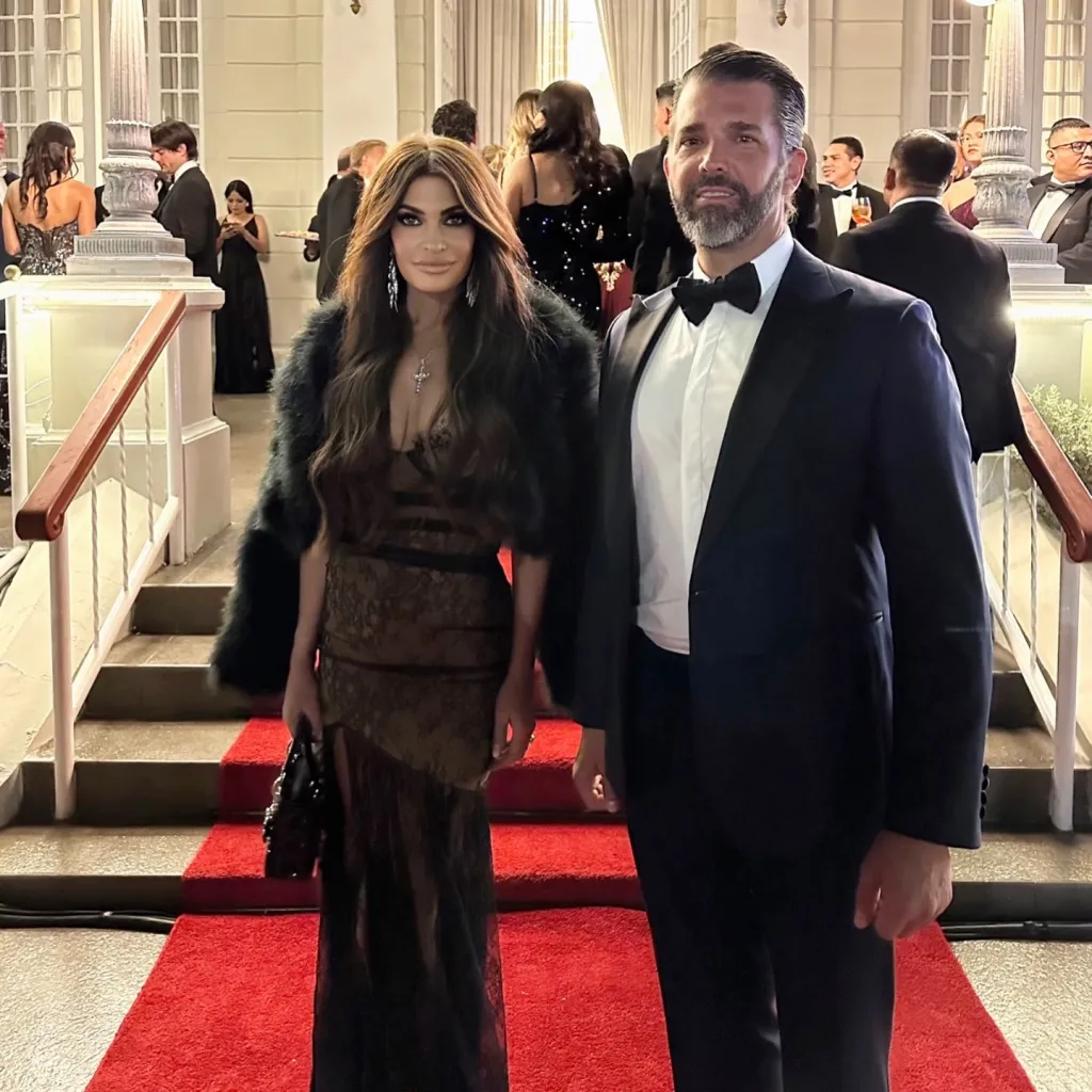 Kimberly Guilfoyle and Donald Trump Jr. on a red carpet.