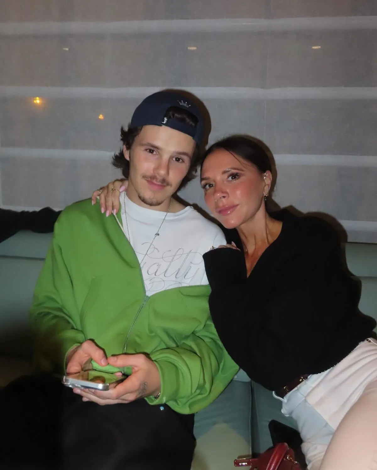 Victoria and Cruz Beckham pose together.