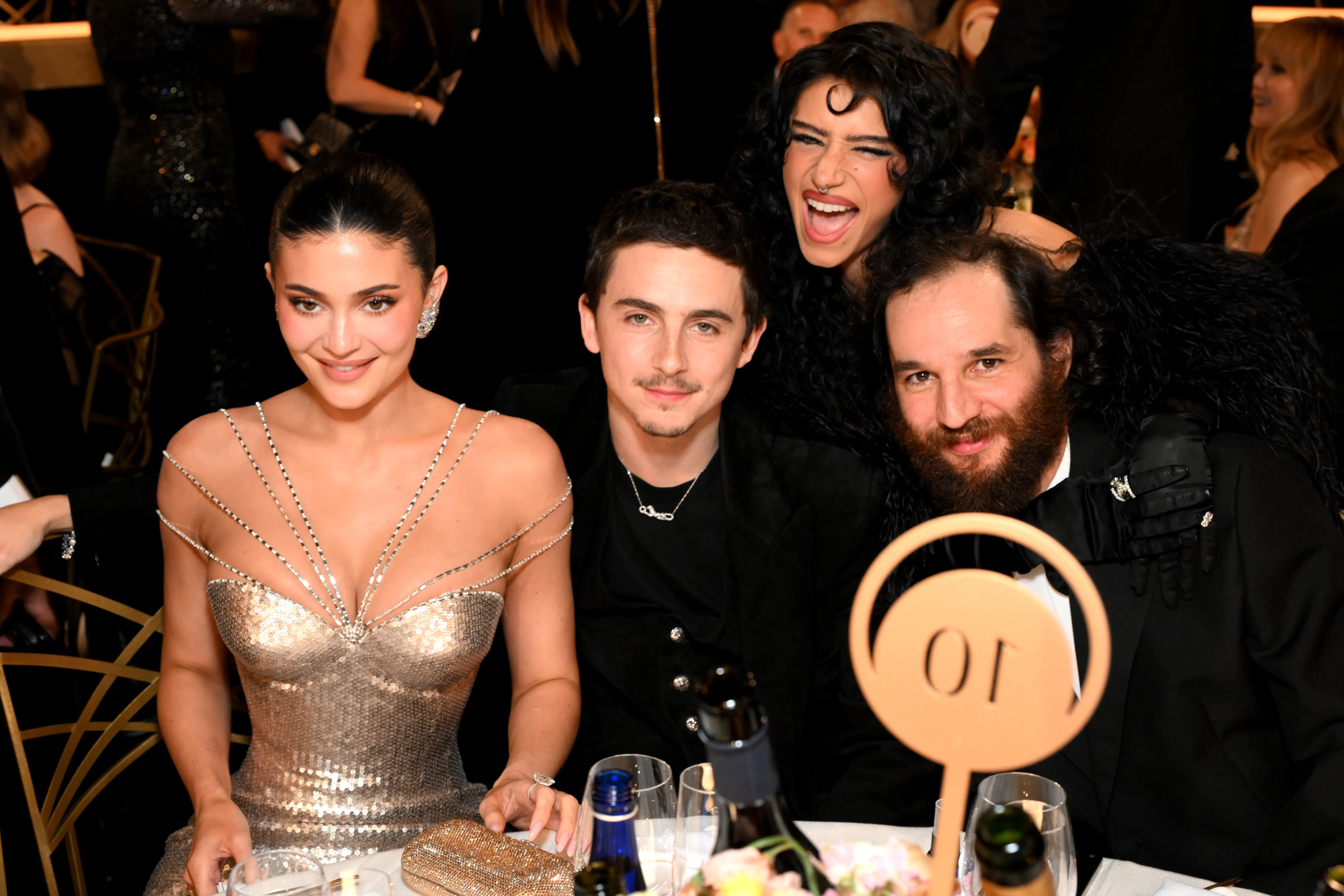 Kylie Jenner, Timothée Chalamet, Odessa A'zion, and Josh Safdie at the 83rd Annual Golden Globe Awards.