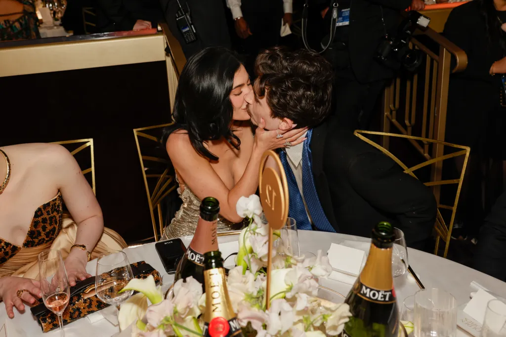 Kylie Jenner and Timothée Chalamet kissing at the 82nd Annual Golden Globe Awards.
