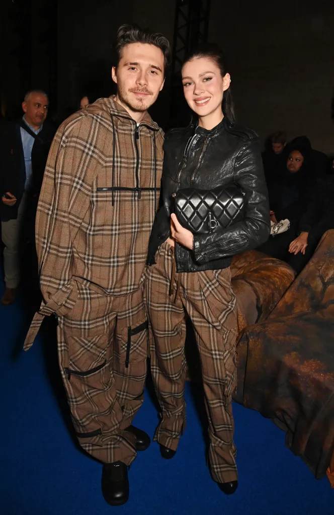 Brooklyn Beckham and Nicola Peltz attend the Burberry Winter 2025 show.