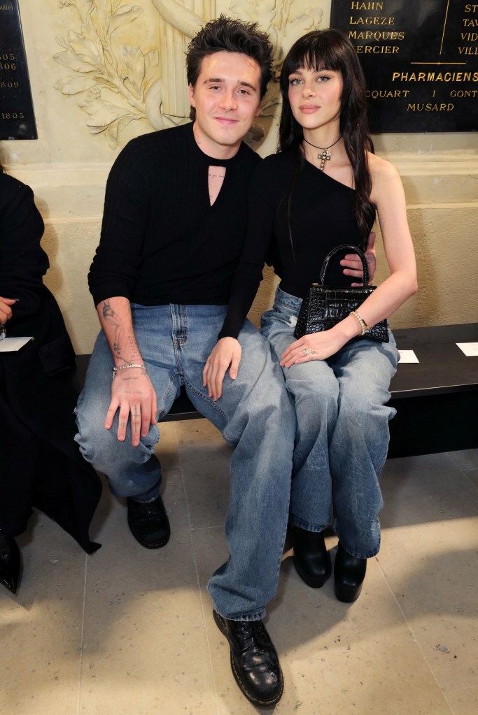 Brooklyn Beckham and Nicola Peltz Beckham attend the Victoria Beckham Spring/Summer 2023 Runway show in Val-de-Grace on September 30, 2022 in Paris, France. 